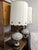 Beautiful pair of vintage lamps, passed down through four generations. White glass body with gold patterns. Base is marble...