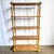 A beautifully crafted Boho Chic étagère featuring a faux bamboo frame with five woven herringbone rattan shelves. Its...