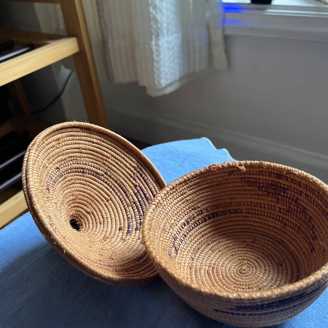 4.5 inches wide x 5 inches H. African sweet grass trinket basket. Beautiful artistry made.