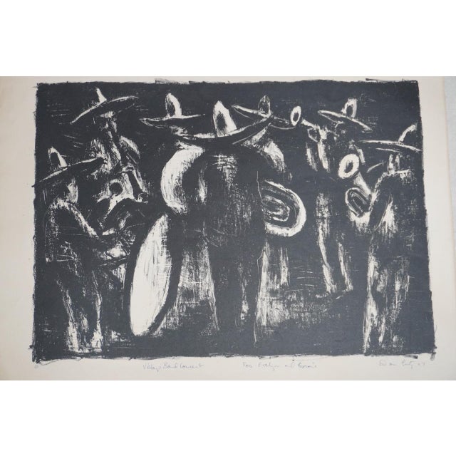 Lithograph depicting a lively group of men in sombreros playing musical instruments, titled "Village Band Concert" by...