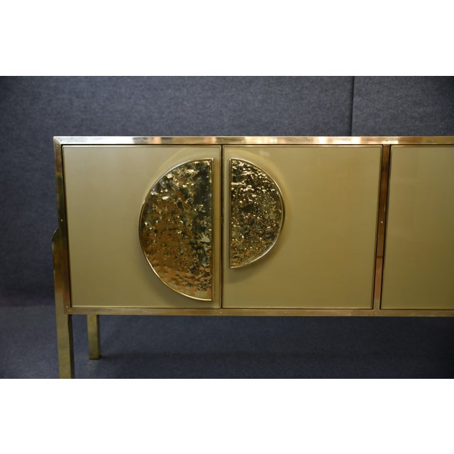 Italian Birch Sideboard Embellished with Gold Murano Glass and Brass Handles This exquisite Italian birch sideboard is a...