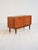 Teak sideboard with two hinged doors and four drawers. Danish production from the 1960s. This 1960s Danish teak sideboard...