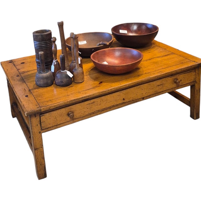 A Melrose Collection by Guy Chaddock rustic pine coffee table. It measures 48 inches in diameter.