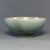 This vintage‑style Chinese Longquan celadon bowl features tender pale‑green glaze and a neatly‑finished thin rim....