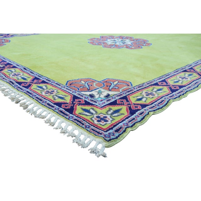 One-of-a-kind Moroccan vintage rug, hand-knotted with a low wool pile. Features intricate floral medallions in natural...