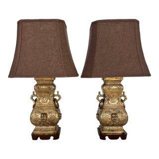 Vintage Pair Asian Archaic Brass Urn Lamps James Mont Style With Linen Shades For Sale