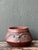 This vintage handcrafted ceramic bowl celebrates traditional craftsmanship through its expressive tribal-inspired design...