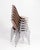 A set of seven Mid Century Krueger Metal Products Fiberglass stacking chairs after the design of Charles and Ray Eames....