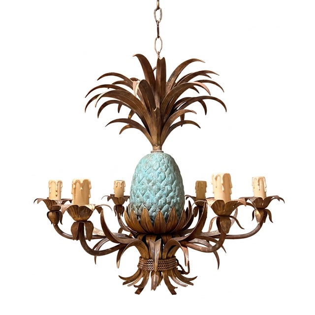 A lovely verdigris pineapple chandelier, with tolewear leaves made in france in the 1950s. rewired for the uk, this can...