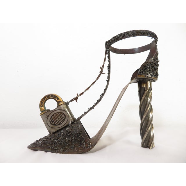 Unique, one of a kind, recycled metal welded art sculpture by Micki Voorhies out of Oregon. I believe this is a series...