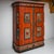 Hand-painted two-door folk armoire from Franconia, crafted in fir wood, featuring panelled doors adorned with figural...