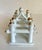 This charming vintage porcelain toast rack features a sculptural pagoda-inspired design with glossy white glaze and...