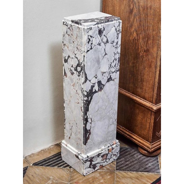 Restored marble pedestal made of Italian marble. The pedestal is restored in the workshop of an artistic stonemason. A...