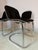 This cantilever chair by Gastone Rinaldi combines bold metal architecture with the luxurious seating comfort of the 1970s....