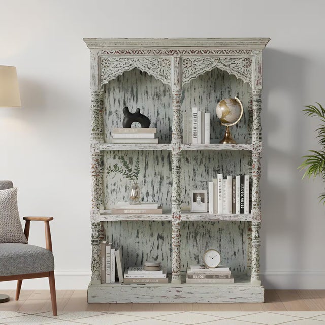 Step into a world of curated elegance and soulful artistry with our breathtaking Handcrafted White Wood Bookcase. This...
