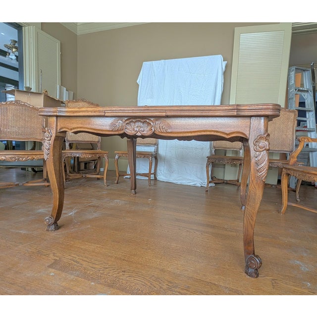 Mid century American reproduction of French Louis XV dining table. Extending Farmhouse parquetry with two built-in leaves....