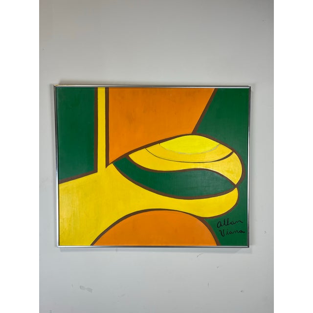 Striking mid century painting in vibrant colors. Artist signed. Framed in a brushed chrome.