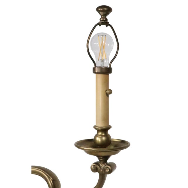 Exquisite, finely crafted adjustable desk lamp, with original pleated shade. The lamp is constructed of heavy cast brass...
