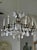Chinoiserie Pair of Maison Bagues Patinated Iron and Rock Crystal Chandeliers For Sale - Image 3 of 9