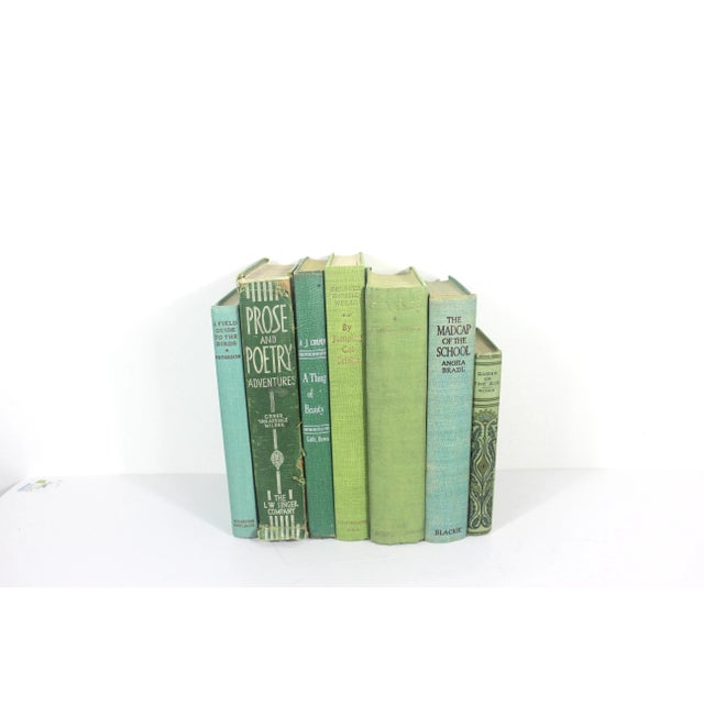 This is a curated designer set of old green books with linen hardcovers. These are in fabulous, worn vintage condition...