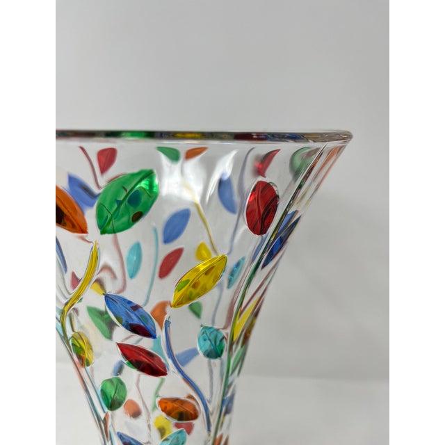 This lovely vase features incredible colors and it would be a wonderful addition to any room. Handcrafted in Italy of fine...