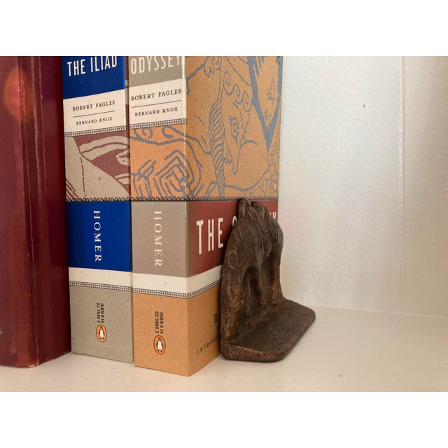Pair of vintage cast iron grazing horse bookends