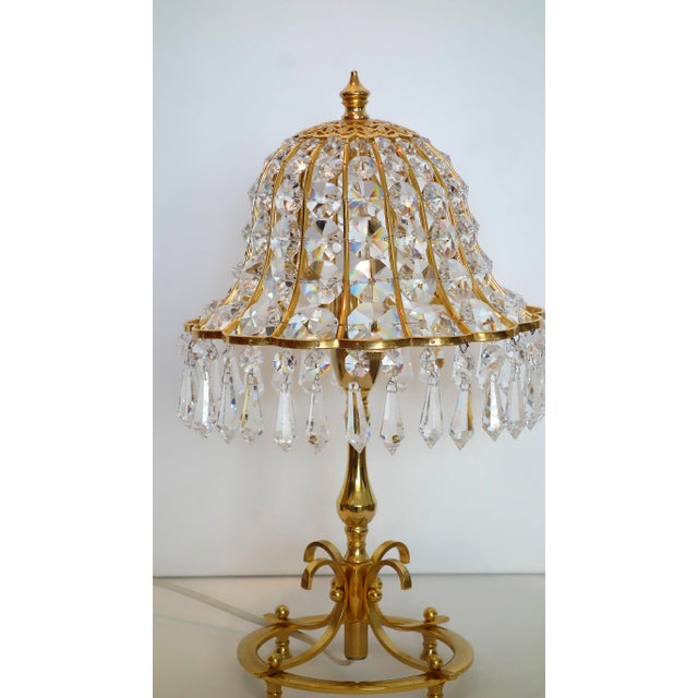 Swedish Brass and Lead Crystal Table Lamp, 1980s, in Very Good conditions. Designed 1980 to 1989 This piece has an...