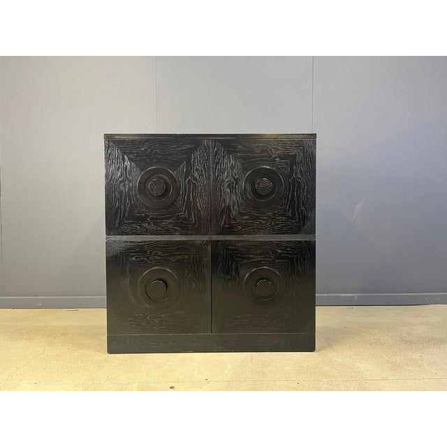 Beautiful black wenge wooden brutalist bar cabinet. The cabinet consists of 4 doors. Good condition. 1970s - Belgium...
