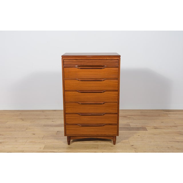This mid century dresser in teak was produced in by the manufacture White & Newton in Great Britain the 1960s. The dresser...