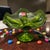 This Vintage Mid-Century Modern Viking Glass Avocado Green Ruffled Edge Compote Bowl is a handmade candy dish from the...