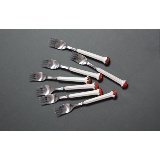 Individually sold. Wonderful design of flatware with a ceramic handle in white, orange red, and brown. Mushroomed at the...