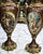 Make a bold statement with this elegant burgundy porcelain vase, designed in a refined French style. The rich guinda...