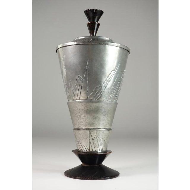 Futurist Metal and Black Wood Urn Vase, 1920s, in Flawless conditions. Designed 1920 to 1949