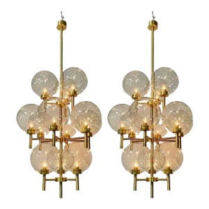 Pair of Monumental Mid-Century Modern Style Chandeliers in Amber Glass and Brass