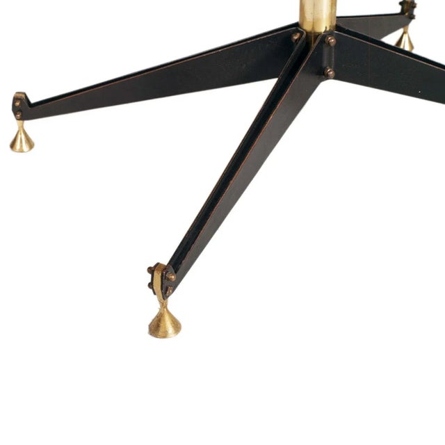 Elegant mid-century oval coffee table by rima attributed to gio ponti in black painted iron, brass and marble. Important...