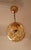 An Italian designed Murano glass sphere pendant with brass hardware by La Murrina. Brass inserts in the blown...