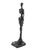 This modern bronze sculpture represents a standing female figure rendered in an elongated and abstract form. Cast in dark...