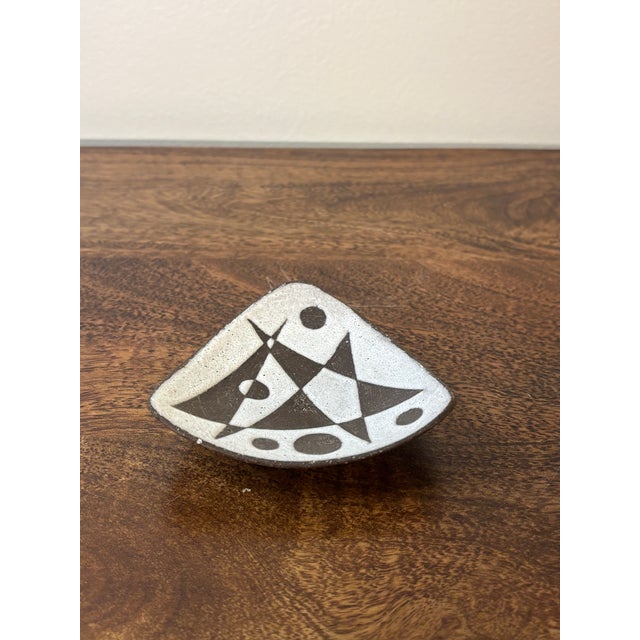 Very fine mid-century studio pottery dish by Thomas Toft, made in Denmark in the 1950s. This sculptural triangular form...