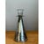 This vintage candle holder is a study in simple geometry, with a tall, smooth cone of mercury-style silvered glass rising...