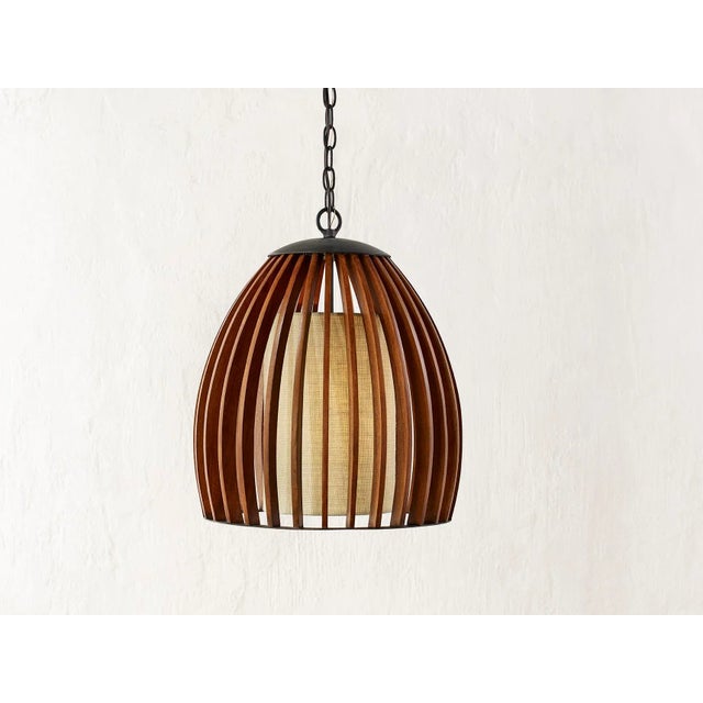 The dome-shaped Carling Pendant flaunts a mid-century modern aesthetic. The cage of its body is made of softly curved...