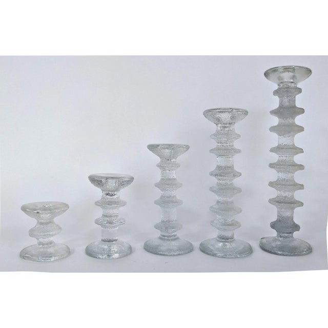 Set of 5 Vintage textured clear molded ice glass Candlesticks, composed as a column with projecting bands, a flared mouth...