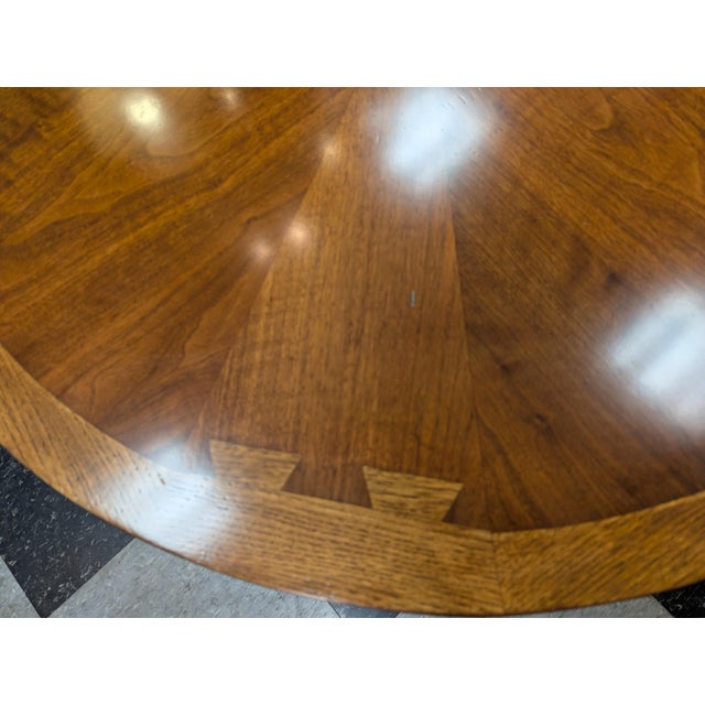 Original Mid-Century Lane Coffee Table. Mixed natural hardwoods with dovetail design. Tapered legs. Bottom is stamped with...