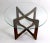 Circular glass top table with sculpted wood base designed by Adrian Pearsall. This example is in very good original...