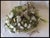 A beautiful group of vintage white silk flowers. The flowers are made of fabric that look like linen or a silk blend and...