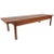 This stunning vintage modern coffee table features cane sides and a gorgeous walnut finish. Unique design with an...