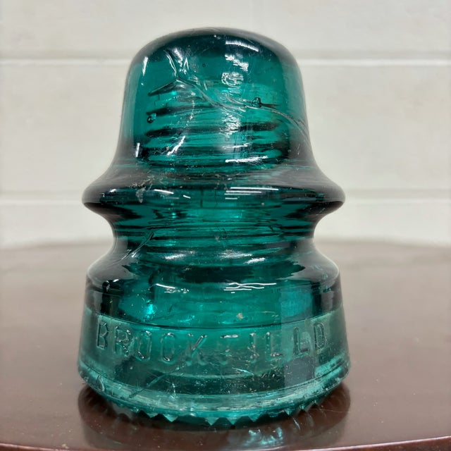 This is a gorgeous antique teal glass Brookfield New York Insulator embossed. Classic double-petticoat design with...
