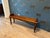 Beautiful mahogany window seat, versatile enough for various uses—for instance, as a small daybed. It features a warm tone...