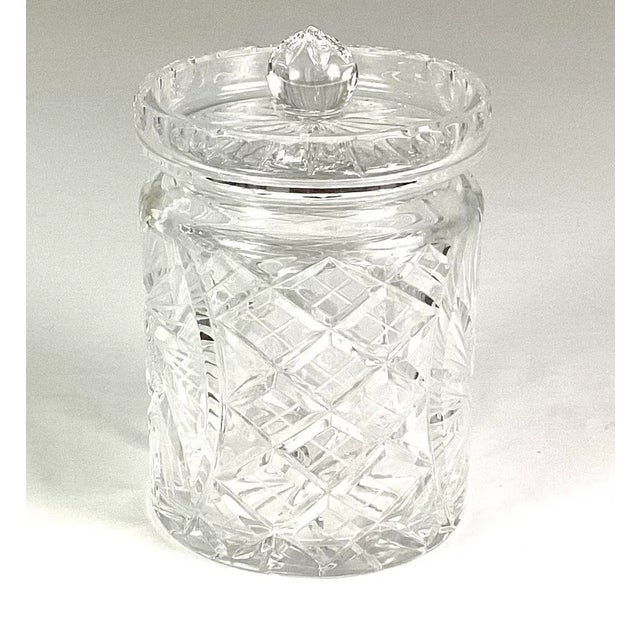 Superior cut and polished cut glass biscuit jar Decorated with starburst and cross hatch diamonds