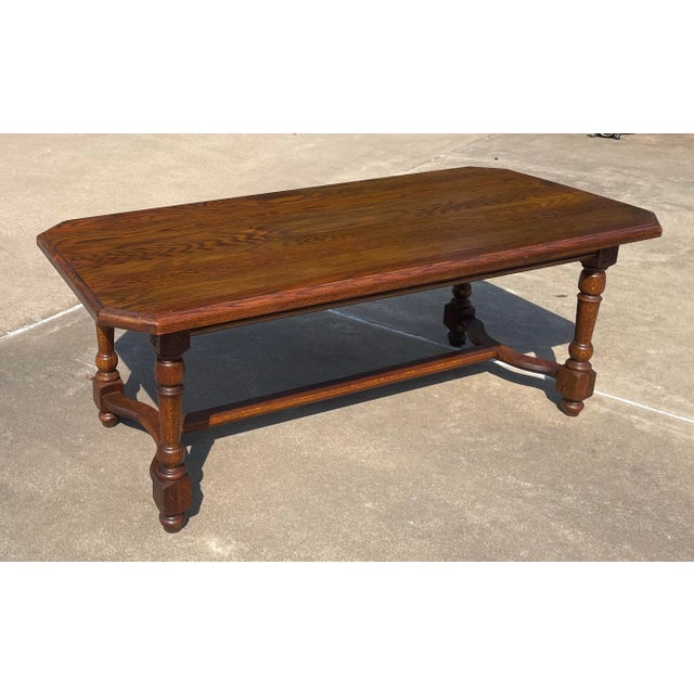 Love this French country dining table. It has beautiful turned legs with a carved detail and stretchers for stability...