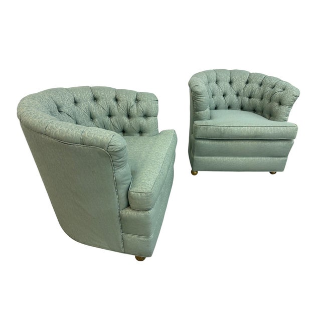 Bring timeless comfort and classic sophistication into your home with this pair of vintage circa 1960s tufted barrel back...